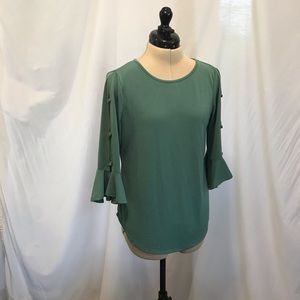 Green knit blouse